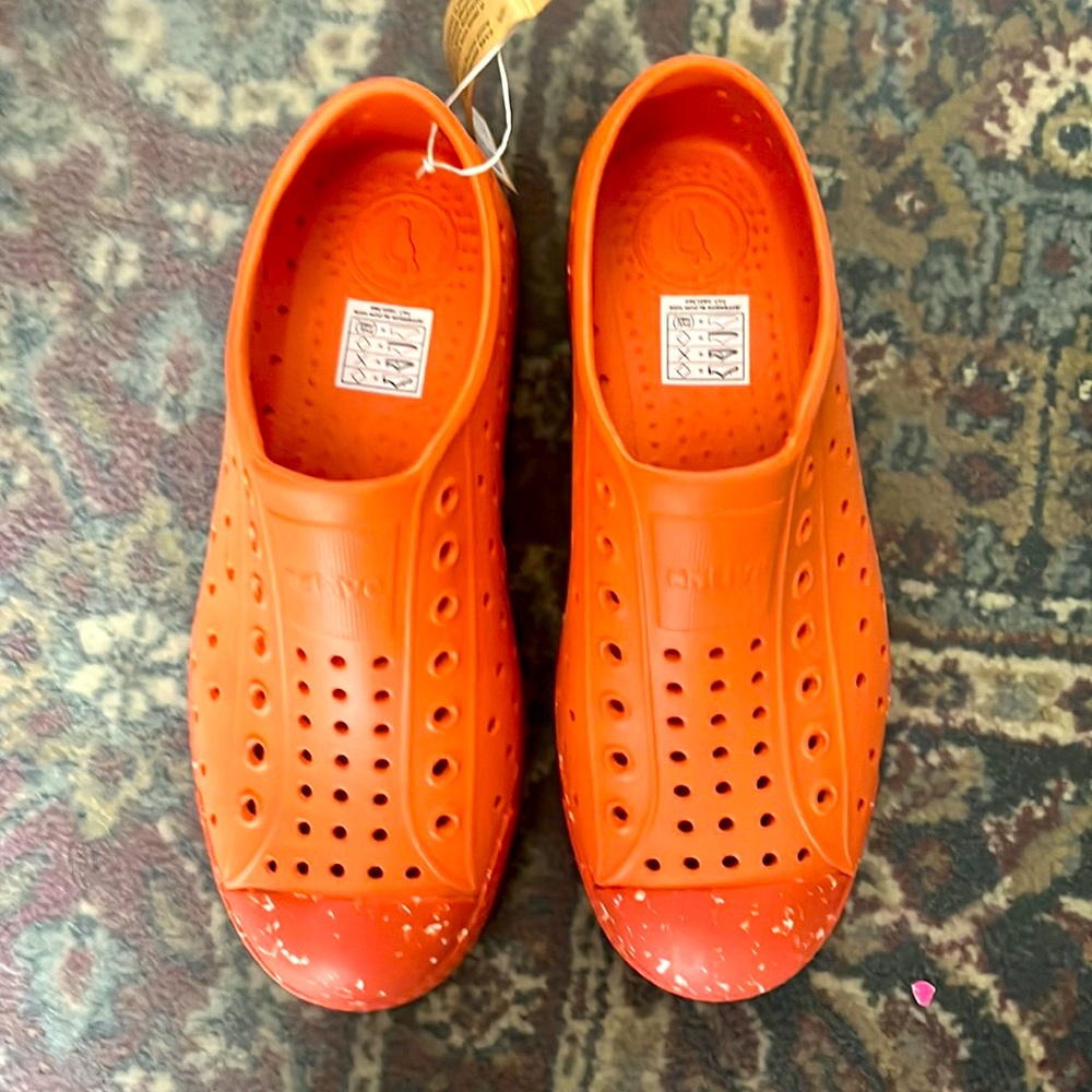 New natives kids. Size 2. Beautiful orange. Unisex. NWT